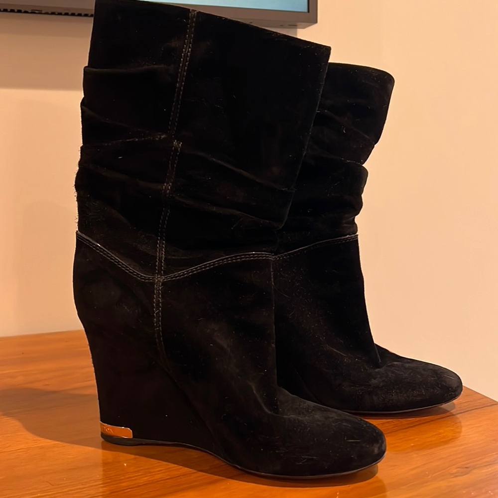 Black suede boots.